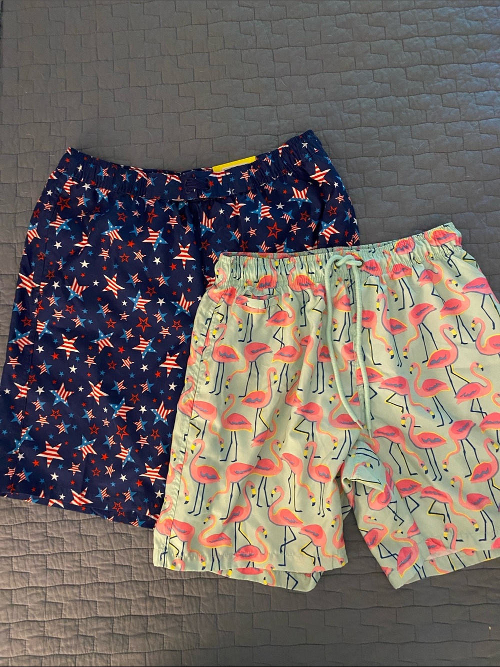 Fireworks & flamingos swim trunks M
